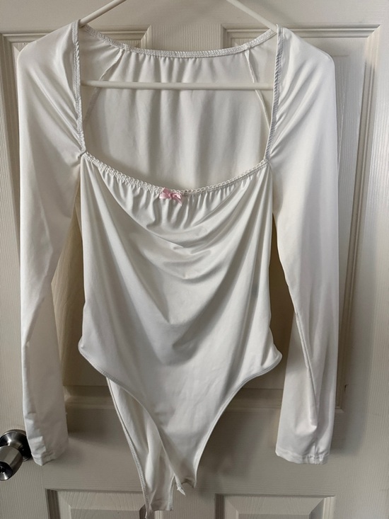 SHEIN Tops - SHEIN White Long Sleeve Draped Bodysuit with Pink Bow